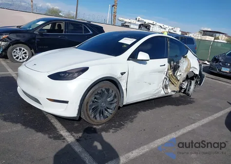 2021 Tesla Model Y Standard Range Rear-Wheel Drive from USA, damaged, VIN 5YJYGDED2MF103025